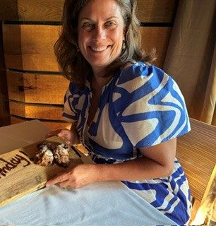 Ann Hatcher smiling at a birthday celebration.
