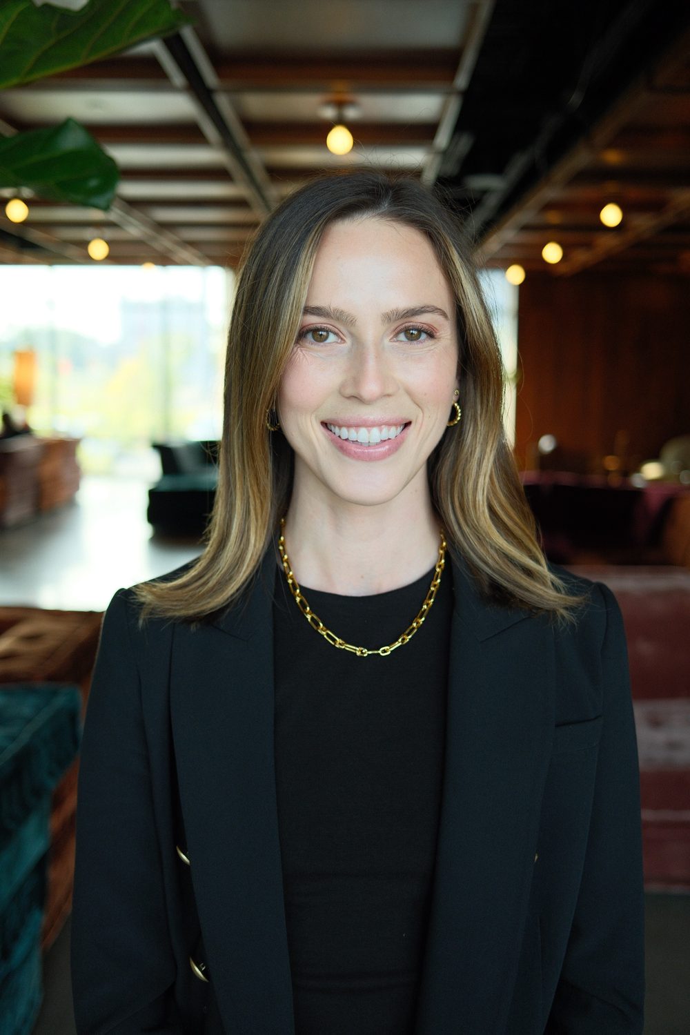 Cayce Smith, LMFT, smiling headshot.